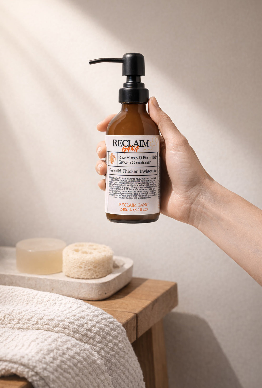Hand holding Reclaim Gang Restore Conditioner